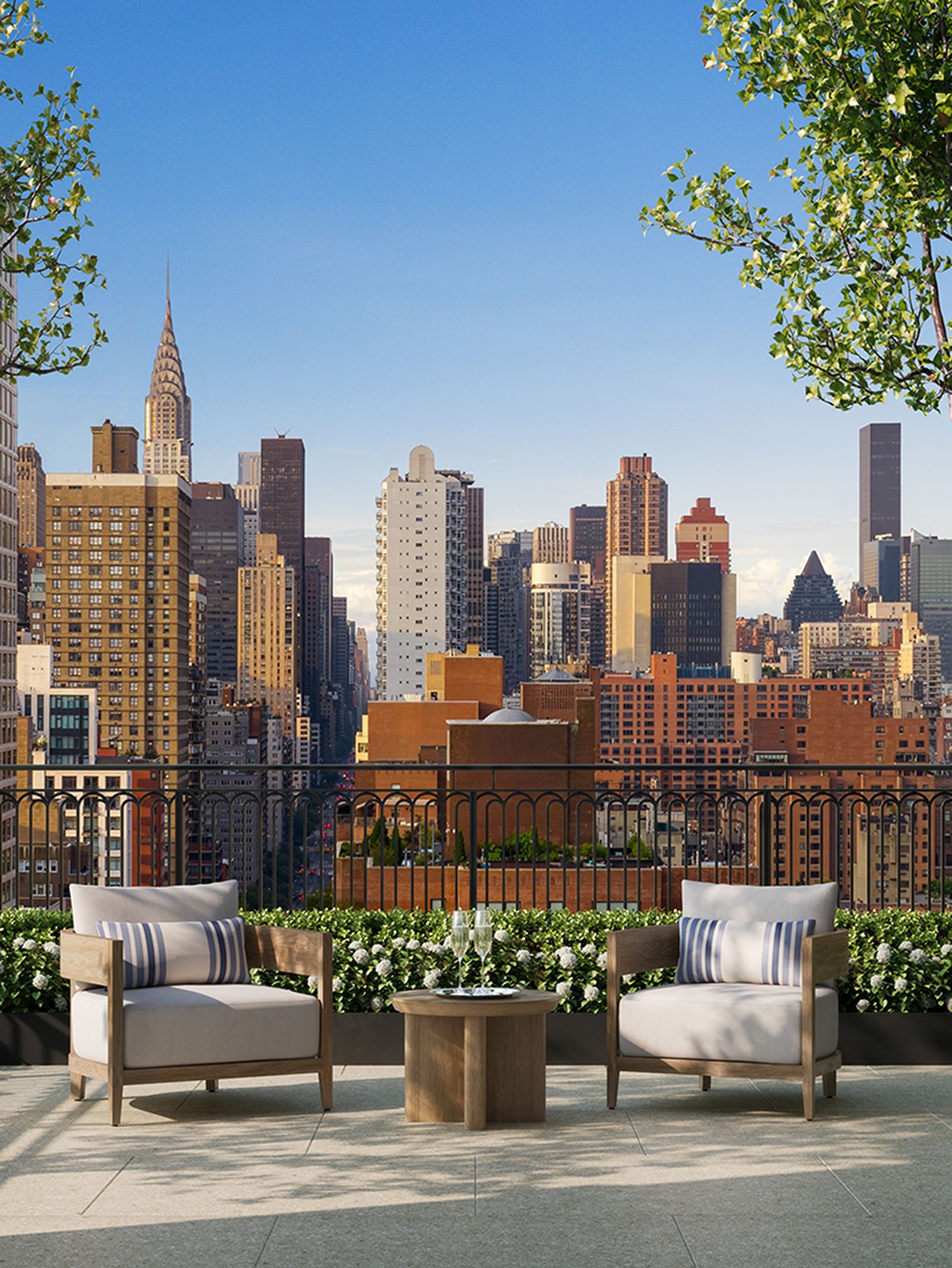 Stylish penthouse terrace overlooking New York City skyline views at The Willow residences in Gramercy, NYC.