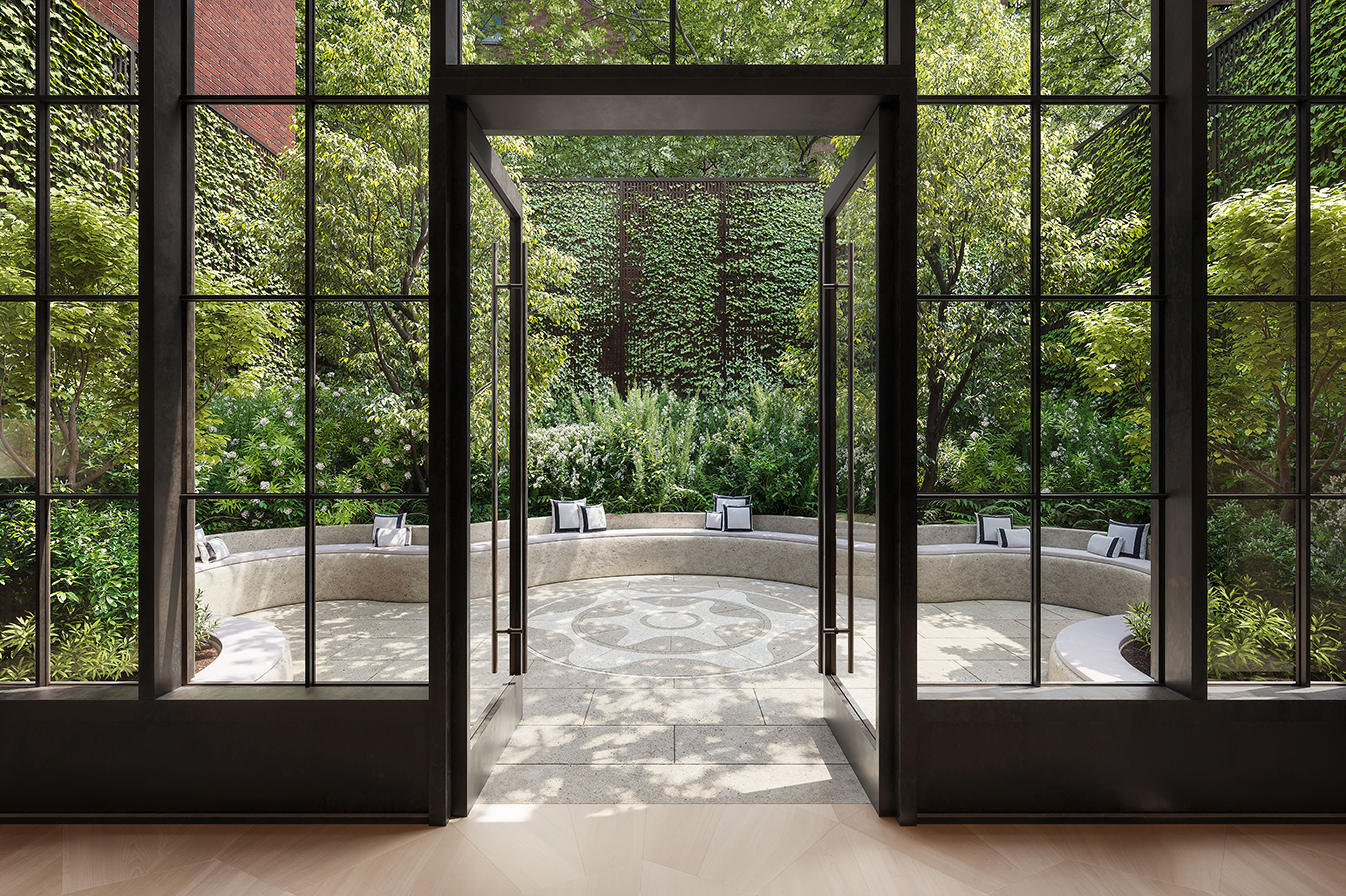 Landscaped courtyard garden surrounded by greenery at The Willow, new luxury condops in Gramercy.